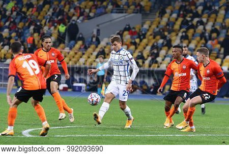 Kyiv, Ukraine - October 27, 2020: Nicolo Barella Of Inter (in White) Attacks During The Uefa Champio