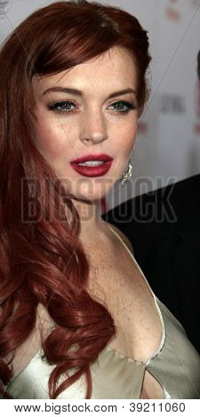 LOS ANGELES - NOV 20:  Lindsay Lohan arrives to the private dinner for the premiere of Lifetime's 'Liz & Dick'  at Beverly Hills Hotel on November 20, 2012 in Beverly Hills, CA