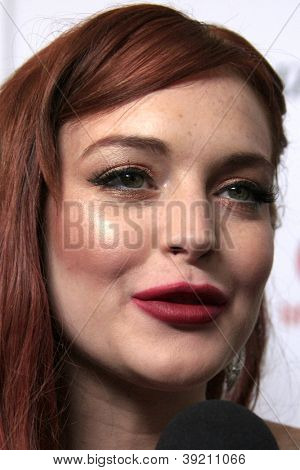 LOS ANGELES - NOV 20:  Lindsay Lohan arrives to the private dinner for the premiere of Lifetime's 'Liz & Dick'  at Beverly Hills Hotel on November 20, 2012 in Beverly Hills, CA