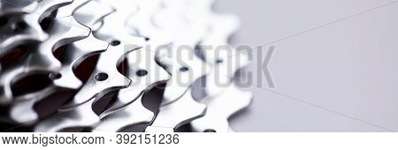 Close-up Of Bicycle Roller Chain That Transfers Power From Pedals To Drive. Macro Shot Of Metal Whee