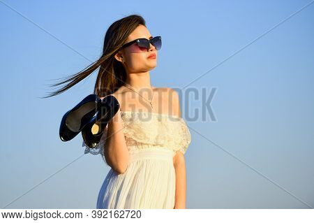 Afterparty Concept. Woman Sunrise Carry High Heels In Hand. Woman On Sunny Morning Blue Sky. Model T