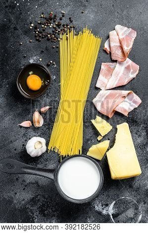 Traidtional Italian Pasta Carbonara Ingredients. Bacon, Spaghetti, Parmesan And Pecorino Cheese, Egg