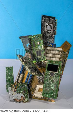 Abstract Figure Folded From Computer Circuit Boards On A Colored Background