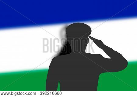 Solder Silhouette On Blur Background With Lesotho Flag.