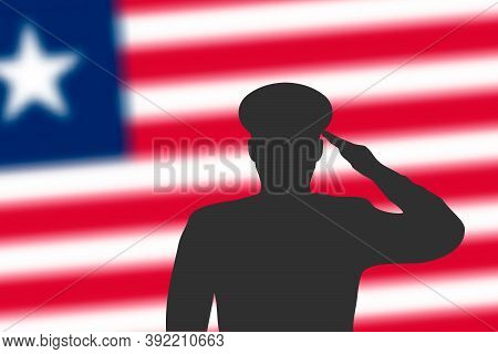 Solder Silhouette On Blur Background With Liberia Flag.