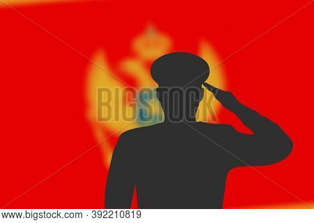 Solder Silhouette On Blur Background With Montenegro Flag.