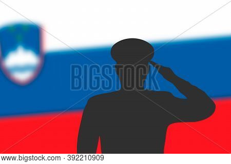 Solder Silhouette On Blur Background With Slovenia Flag.