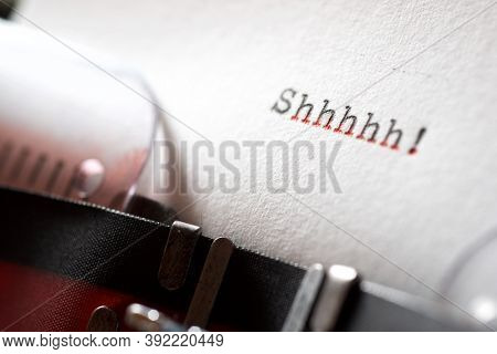 Shhhhh word written with a typewriter.