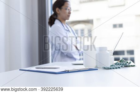 Closeup portrait, Scientists in white lab coats are analyzing the vital substance of the Blood vesse