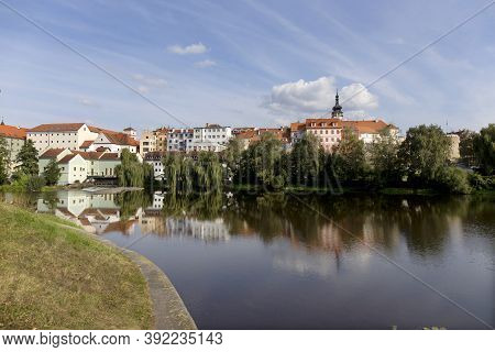 Colorful Medieval Town Pisek Above The River Otava With The Deanery Church, Czech Republic