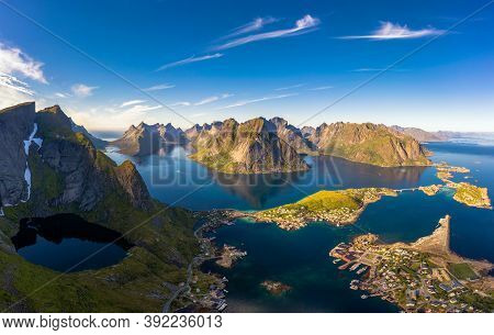 Panorama Of Mountains, Fjords And Reine Fishing Village In Lofoten Islands, Norway Viewed From The M