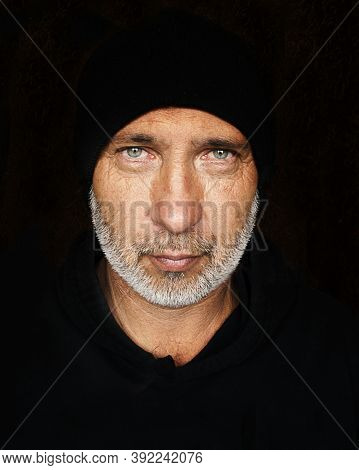 Portrait Of The Man In Black And White