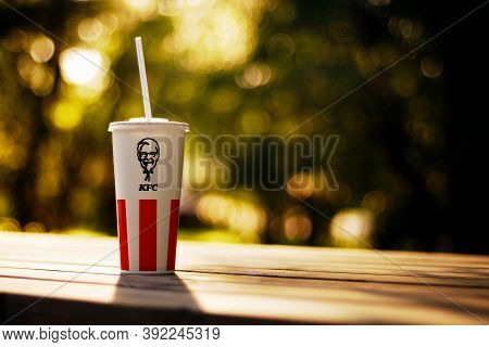 Paper Cup With Kfc Logo On Blurry Trees Background Outdoors, Moscow 14/09/2019