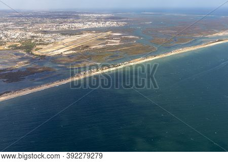 Aerial Of Faro With Harbor And Beach In Portugal