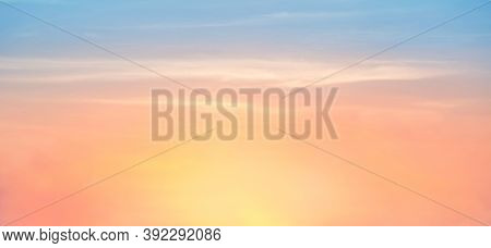 Beautiful Sky Painted By The Sun Leaving Bright Golden Shades.dense Clouds In Twilight Sky In Winter