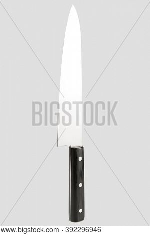 Chef knife isolated on gray background