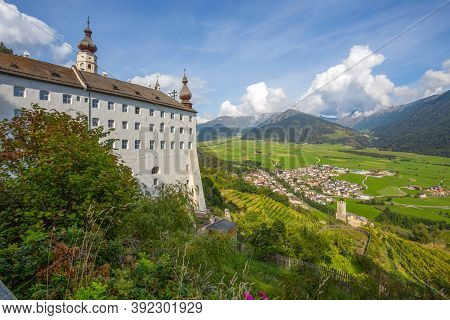 Aerial View Of The Historic Center Of Burgusio And The Benedictine Abbey Of Monte Maria (abtei Marie