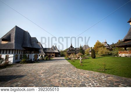 Barsana, Romania - October 28, 2020: View of Barsana Wooden Monastery site in Maramures County, Romania.
