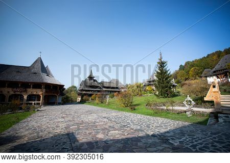 Barsana, Romania - October 28, 2020: View of Barsana Wooden Monastery site in Maramures County, Romania.