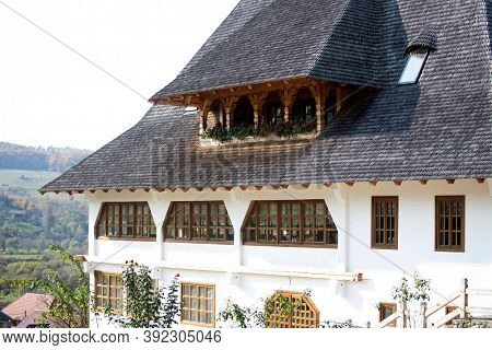 Barsana, Romania - October 28, 2020: View of Barsana Wooden Monastery site in Maramures County, Romania.