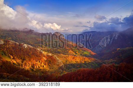 aerial view of Carpathian mountains countryside in autumn morning, Romania