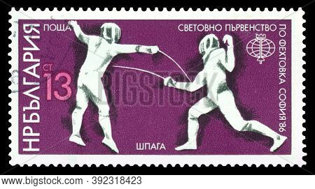 Stavropol, Russia - October  30, 2020: A Stamp Printed By  Bulgaria, Shows Fencers, Sword, 1986 Fenc
