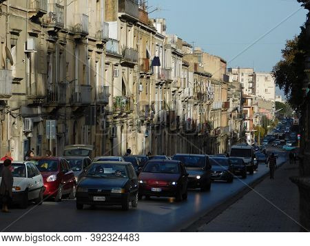 Caltagirone, Sicily, Italy. May 6 2017. A View Of A Caltagirone's Street And Some Cars And Building