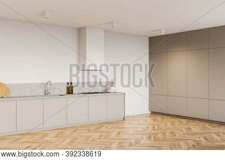Corner Of Modern Kitchen With White Walls, Wooden Floor And Gray Cupboards. 3d Rendering