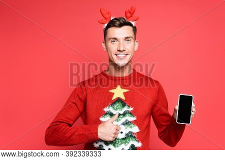 Front View Of Happy Young Adult Man With Thumb Up, Showing Smartphone With Blank Screen Isolated On 