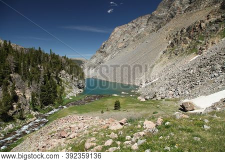 West Fork Rock Creek Flowing Into Sundance Lake In Beartooth Mountains, Montana