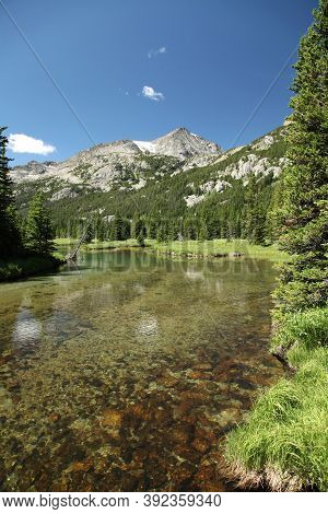 West Fork Rock Creek Flowing In Beartooth Mountains, Montana