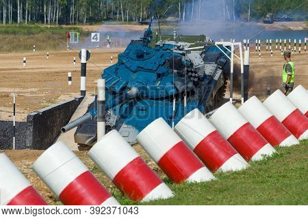Alabino, Russia - August 25, 2020: Tank T-72b3 Of The Team Of Uzbekistan Overcomes The Obstacle 