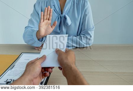Government Officials Refused To Accept Bribes From The Businessmen Offer For Signing In A Contract O