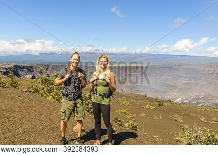 The Hiking Couple Seeing Volcano National Park From Crater On The Caldera Halemaumau Around Hawaii V