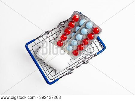 Shopping Metal Empty Basket In Male Hand In Blue Protecive Glove. Shopping During Coronavirus Lockdo