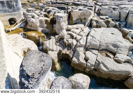 Impressive Rock Formation In The Ain River At Pont De Poitte Village , Jura In France