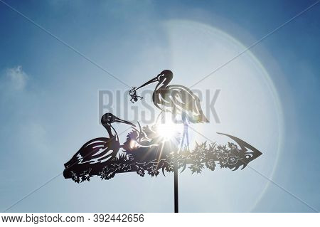 Weather Vane Against A Sky. Wind Direction