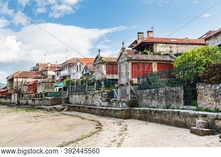 Low Tide At The Well-preserved Village Of Combarro In Ponteveda, Spain, Famous For Its Stone Cruceir