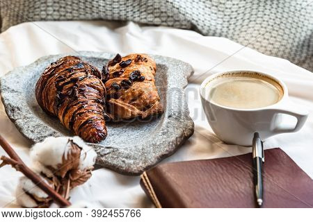 Coffee Mug With Croissant And Empty Notebook And Pencil For Business Plan And Design Ideas Onon Whit