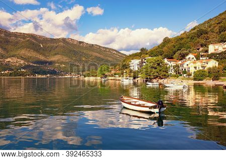 Sunny Autumn Day. Beautiful Mediterranean Landscape, Clouds And Mountains Are Reflected In Water. Mo