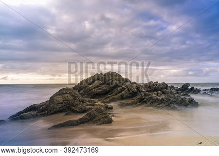 Serantes Beach Landscape With Rocks And Sea Water In Asturias, Spain
