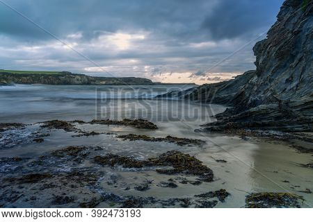 Serantes Beach Landscape With Rocks And Sea Water In Asturias, Spain