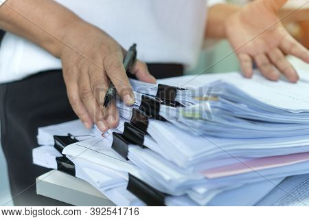 Stacks Of Lot Documents Report Papers With Clips Waiting Be Managed By Office Workers Arranging On D