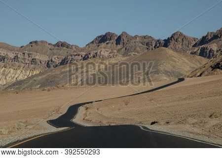 Curved Road In The Desert In Death Valley In The Usa