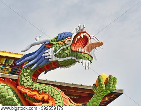 La Boulaye, France - April Circa, 2018. Close Up Of A Colorful Dragon On An Rooftop Of The One Thous