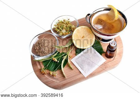 Fresh Healthy Nettle Plant, Lemon And Dried Herbs Isolated On A White Background Good For Coronaviru