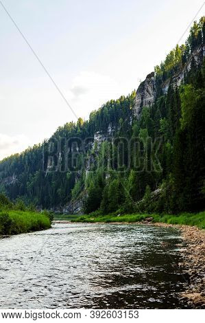 Stone Pillars On River Usva, Perm Region, Russia Bottom View On Natural Background. Text Copy Space.
