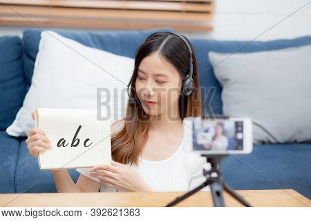 Young Asian Woman Is Teacher Teaching Language English With Student For E-learning Online At Home, G
