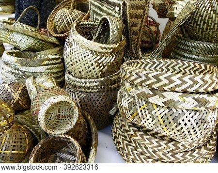 A Pile Of Handmade Natural Traditional Woven Baskets And Other Objects From Esmeralda Province Made 