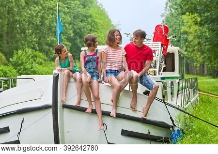 Family Vacation, Summer Holiday Travel On Barge Boat In Canal, Happy Kids And Parents Having Fun On 